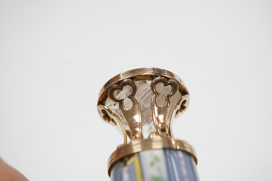 A late 19th century yellow metal and polychrome enamel desk seal, with rock crystal matrix, carved with a monogram, 69mm (small chip to the enamel), in original J.C Vickery fitted gilt tooled leather box.